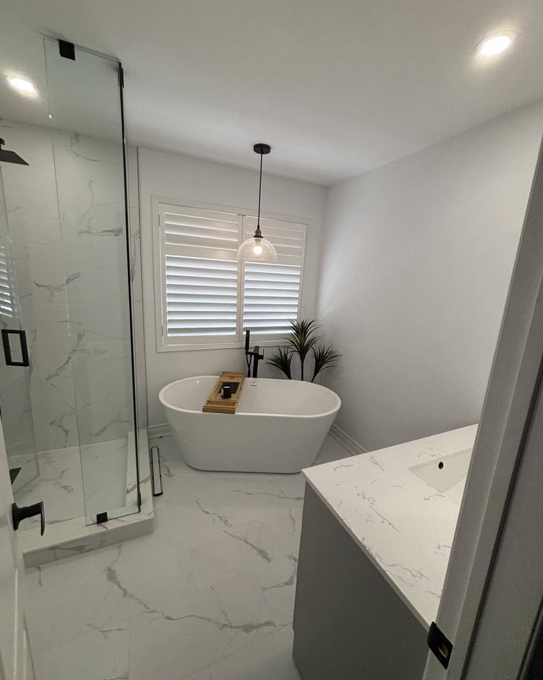 Luxury Ensuite with Freestanding Soaker Tub — image 1