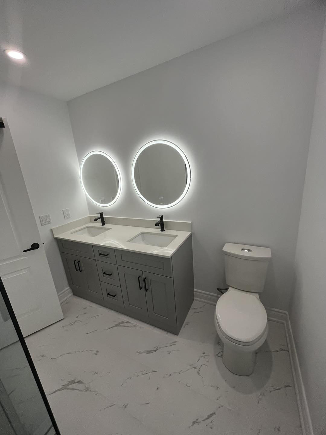Ensuite with Dual Round LED Mirrors — image 1