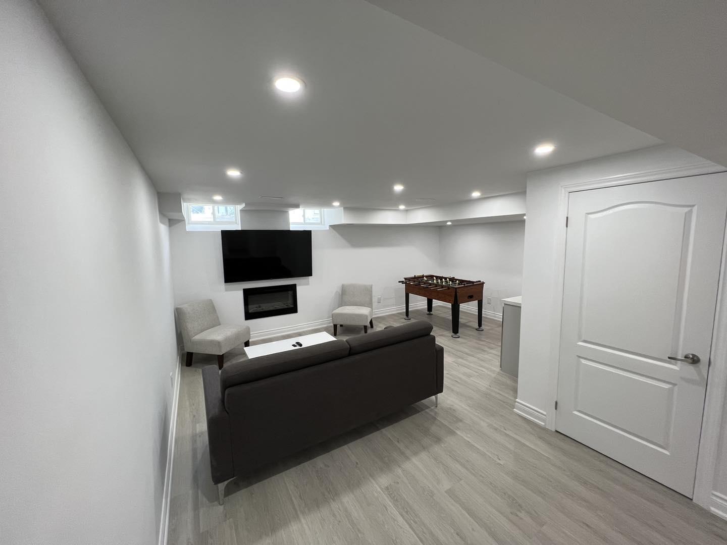 Finished Recreation Room with Fireplace — image 1